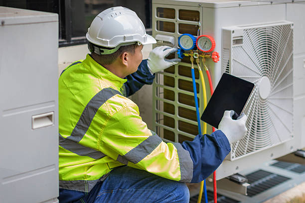 Professional Heat Pump Repair technician working in Passaic, NJ